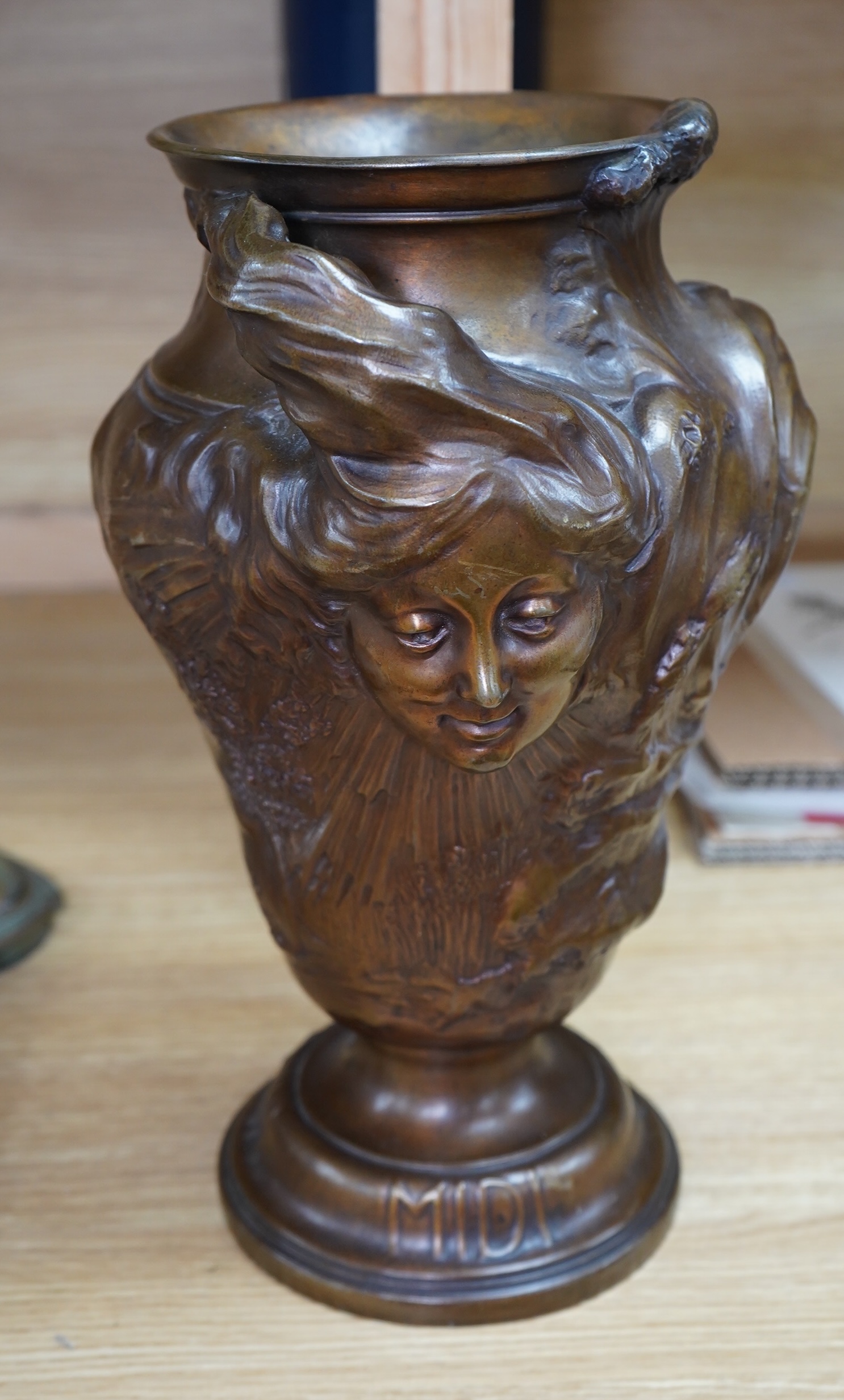 P. Legastelois. An Art Nouveau three sided figural bronze vase, MIDI, SOIR, MATIN written near base, 34cm high. Condition - good